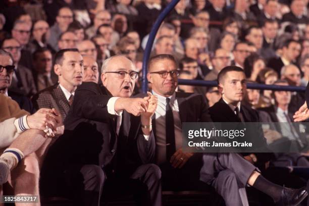 Head coach Adolph Rupp of the Kentucky Wildcats yells to players during a game against the Tennessee Volunteers at Memorial Coliseum on February 26,...