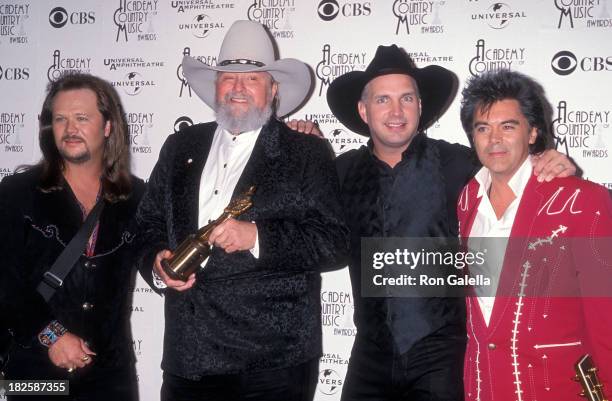 Singer Travis Tritt, singer Garth Brooks, singer Charlie Daniels and singer Marty Stuart attend the 33rd Annual Academy of Country Music Awards on...