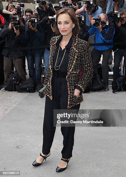 Actress Kristin Scott Thomas attends the Chanel show at Grand Palais during Paris Fashion Week Womenswear Spring/Summer 2014 on September 30, 2013 in...