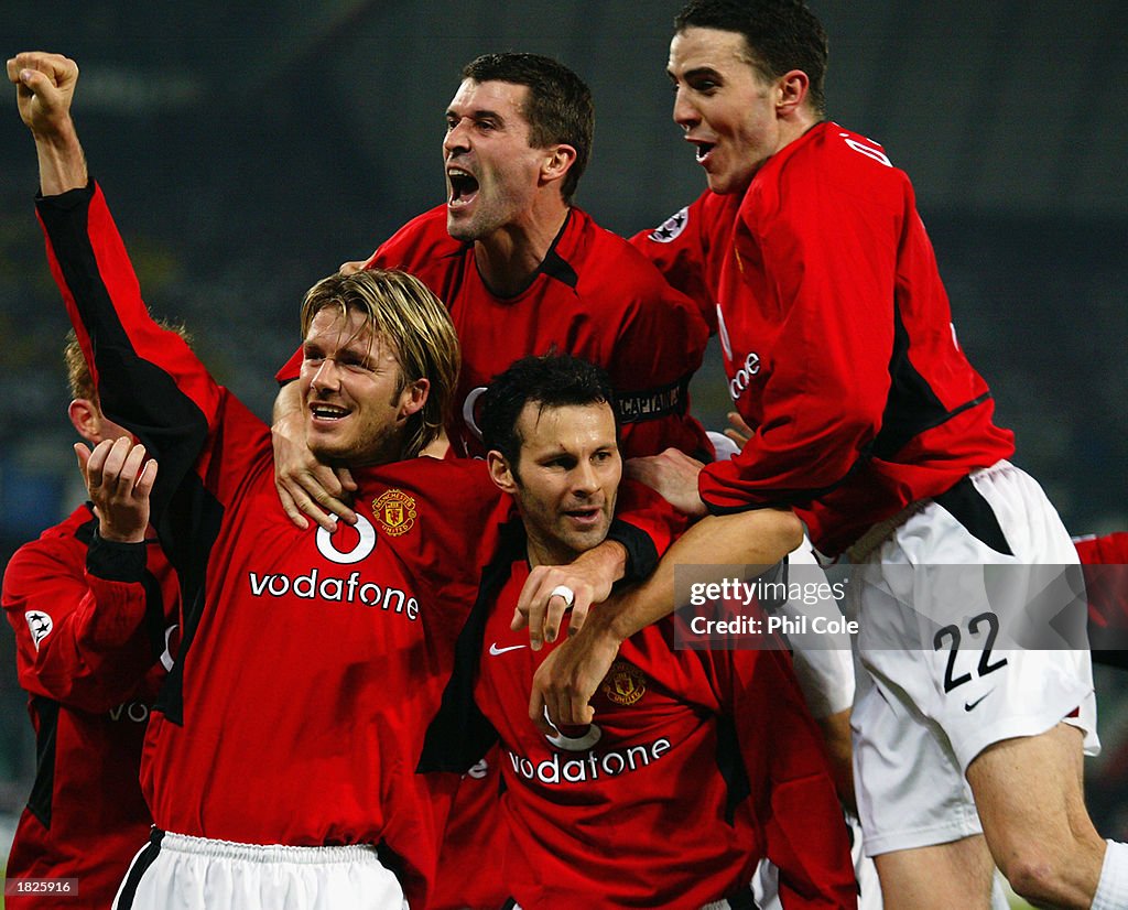 Manchester United players David Beckham, Roy Keane and John O'Shea celebrate team-mate Ryan Giggs superb second goal