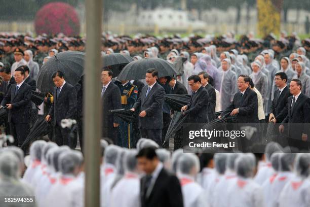 Members of the Politburo Standing Committee Zhang Gaoli, Liu Yunshan, Zhang Dejiang, Xi Jinping, Li Keqiang, Yu Zhengsheng, Wang Qishan and Chinese...