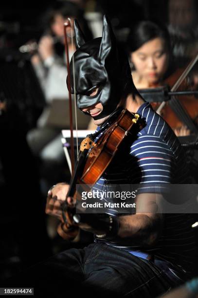 The London Chamber Orchestra rehearse a medley of Hans Zimmer film scores, including 'The Dark Knight Rises' for the Classic BRIT Awards, on October...