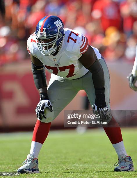 Offensive guard Kevin Boothe of the New York Giants gets set on the line against the Kansas City Chiefs during the second half on September 29, 2013...