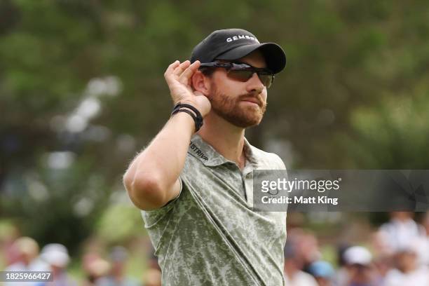 Patrick Rodgers of United States reacts with the crowd after putting on the 16th green during the ISPS HANDA Australian Open at The Australian Golf...