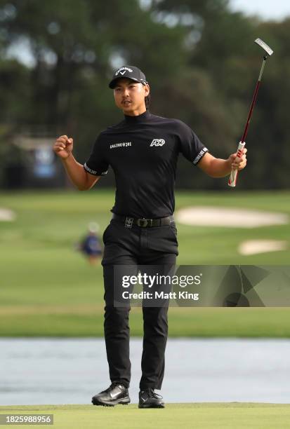 Min Woo Lee of Australia celebrates making a Birdie on the 18th green during the ISPS HANDA Australian Open at The Australian Golf Course on December...