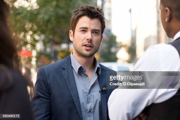 Actor Matt Long visits "Extra" in Times Square on October 1, 2013 in New York City.