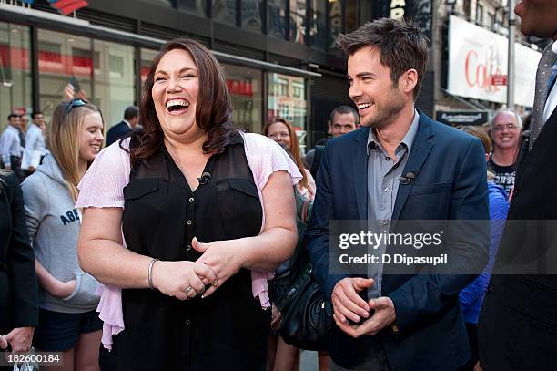 Lucky 7" cast members Matt Long and Lorraine Bruce visit "Extra" in Times Square on October 1, 2013 in New York City.