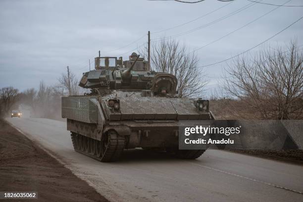 Bradley, light armoured vehicle moves on a road as military mobility continues in Ocheretyne in Avdiivka, Ukraine on December 4, 2023.