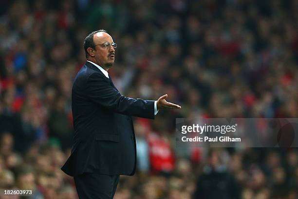 Rafael Benitez the Napoli manager directs his players during UEFA Champions League Group F match between Arsenal FC and SSC Napoli at Emirates...