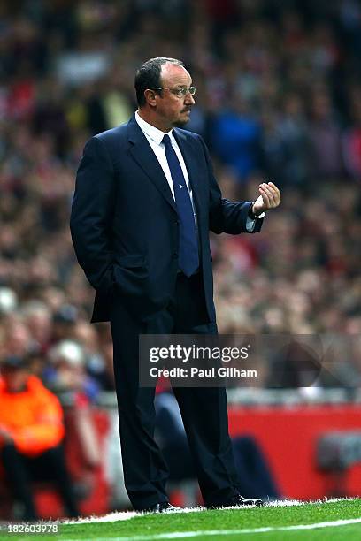 Rafael Benitez the Napoli manager directs his players during UEFA Champions League Group F match between Arsenal FC and SSC Napoli at Emirates...