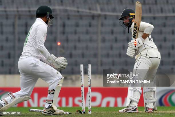 New Zealand's Devon Conway is dismissed by Bangladesh's Mehidy Hasan Miraj during the first day of the second Test cricket match between Bangladesh...