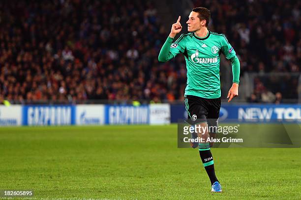 Julian Draxler of Schalke celebrates his team's first goal during the UEFA Champions League Group E match between FC Basel 1893 and FC Schalke 04 at...