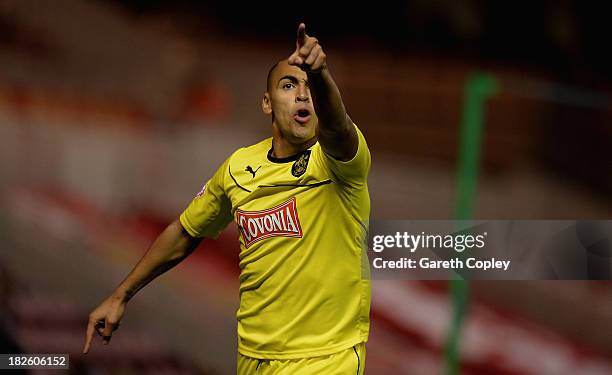 James Vaughan of Huddersfield celebrates after scoring the opening goal during the Sky Bet Championship match between Middlesbrough and Huddersfield...