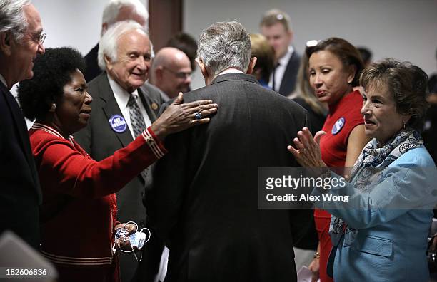 Senate Majority Leader Sen. Harry Reid arrives at a ceremony as he is welcomed by Sen. Tom Harkin , Rep. Sheila Jackson-Lee , Rep. Sander Levin ,...