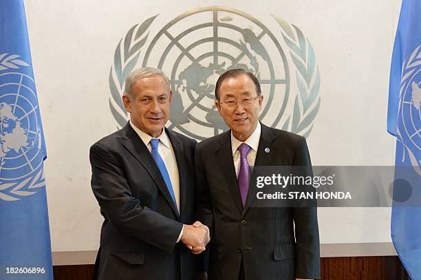 Israeli Prime Minister Benjamin Netanyahu shakes hands with United Nations Secretary General Ban Ki-Moon before their meeting during the 68th Session...