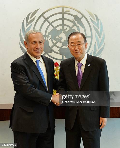 Israeli Prime Minister Benjamin Netanyahu shakes hands with United Nations Secretary General Ban Ki-Moon before their meeting during the 68th Session...