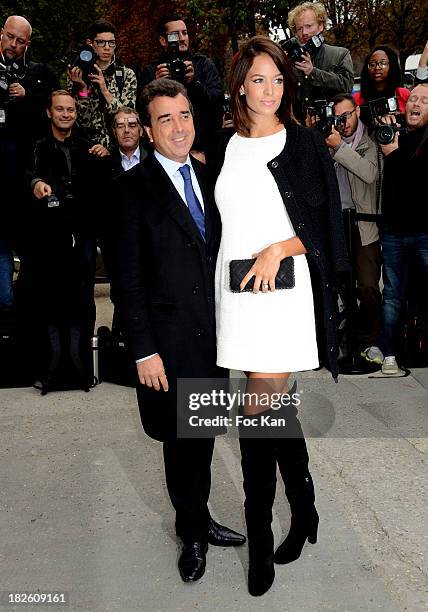 Arnaud Lagardere and Jade Foret attend the Chanel show as part of the Paris Fashion Week Womenswear Spring/Summer 2014 at the Grand Palais on October...