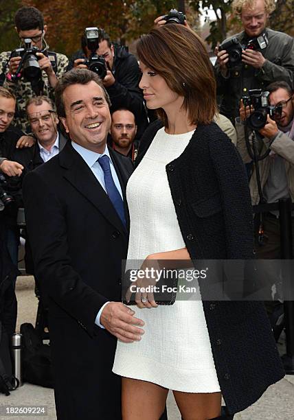 Arnaud Lagardere and Jade Foret attend the Chanel show as part of the Paris Fashion Week Womenswear Spring/Summer 2014 at the Grand Palais on October...