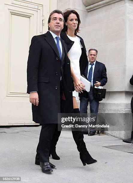 Arnaud Lagardere and Jade Foret attends the Chanel show at Grand Palais during Paris Fashion Week Womenswear Spring/Summer 2014 on September 30, 2013...