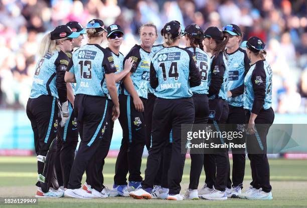 Nicola Hancock of the Brisbane Heat celebrates the wicket of Katie Mack of the Adelaide Strikers for 3 runs with Team mates during the WBBL Final...