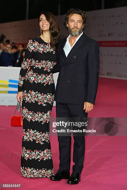 Caterina Murino and Alessio Boni attend the 'Il Ritorno Di Ulisse' premiere during the Fiction Fest 2013 at Auditorium Parco della Musica on October...