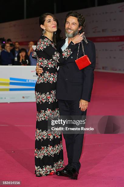 Caterina Murino and Alessio Boni attend the 'Il Ritorno Di Ulisse' premiere during the Fiction Fest 2013 at Auditorium Parco della Musica on October...