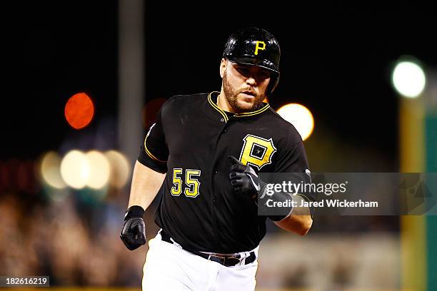 Russell Martin of the Pittsburgh Pirates rounds the bases after his second inning home run against the Cincinnati Reds during the National League...