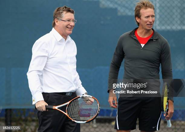 Premier of Victoria Denis Napthine and former Australian tennis player Wayne Arthurs look on during the official launch of the 2014 Australian Open...