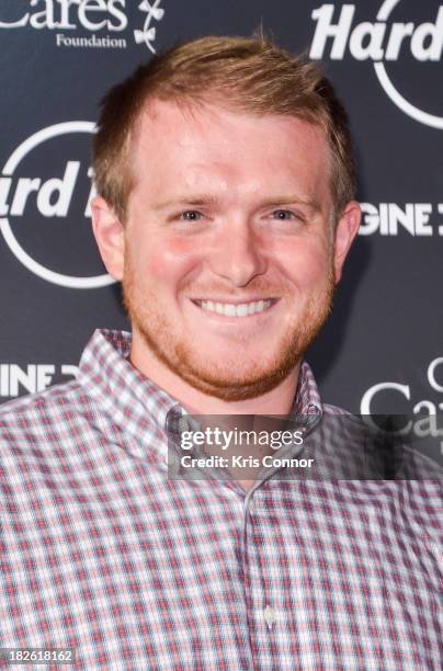 Mogan Cox poses for a photo during Hard Rock Baltimore Grand Reopening With Special Performance By Imagine Dragons at Hard Rock Cafe Baltimore on...