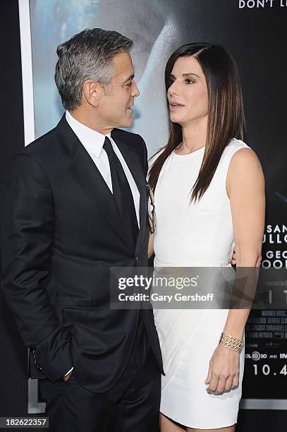 George Clooney and Sandra Bullock attend the "Gravity" premiere at AMC Lincoln Square Theater on October 1, 2013 in New York City.