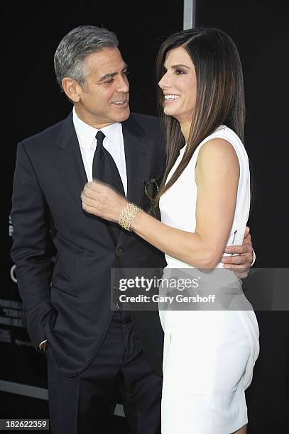 George Clooney and Sandra Bullock attend the "Gravity" premiere at AMC Lincoln Square Theater on October 1, 2013 in New York City.
