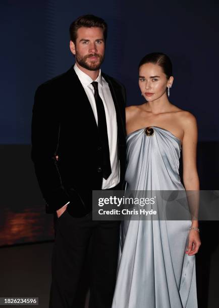 Liam Hemsworth and Gabriella Brooks attend the NGV Gala 2023 at the National Gallery of Victoria on December 02, 2023 in Melbourne, Australia.