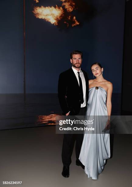 Liam Hemsworth and Gabriella Brooks attend the NGV Gala 2023 at the National Gallery of Victoria on December 02, 2023 in Melbourne, Australia.