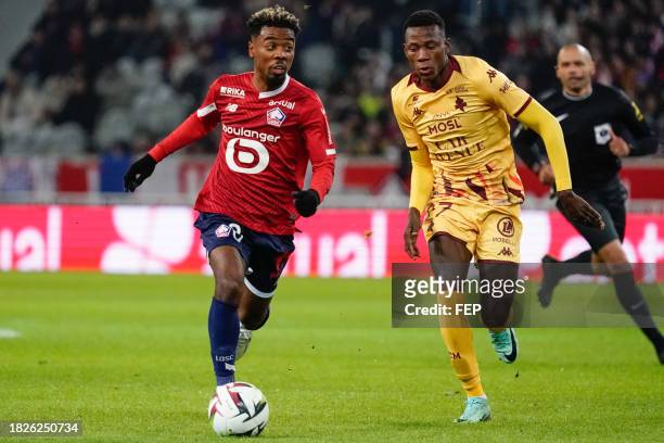 Angel GOMES of Lille and Danley JEAN JACQUES of Metz during the Ligue 1 Uber Eats match between Lille Olympique Sporting Club and Football Club de...