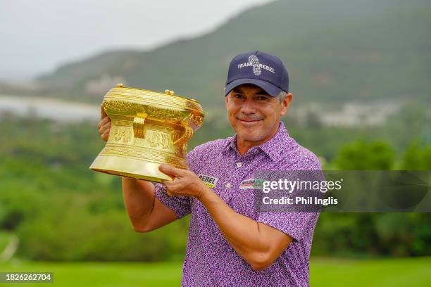 Adilson Da Silva of Brazil poses with the trophy on Day Three of the Vinpearl DIC Legends Vietnam at Vinpearl Resort Nha Trang on December 02, 2023...