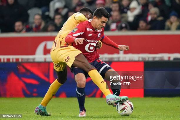 Danley JEAN JACQUES of Metz and Benjamin ANDRE of Lille during the Ligue 1 Uber Eats match between Lille Olympique Sporting Club and Football Club de...