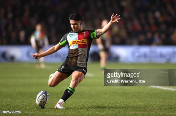 Marcus Smith of Harlequins converts a kick at goal during the Gallagher Premiership Rugby match between Harlequins and Sale Sharks at The Stoop on...