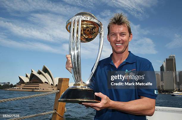 Brett Lee poses on Sydney Harbour with the ICC Cricket World Cup trophy during celebrations to mark 500 days to go until the 2015 ICC Cricket World...