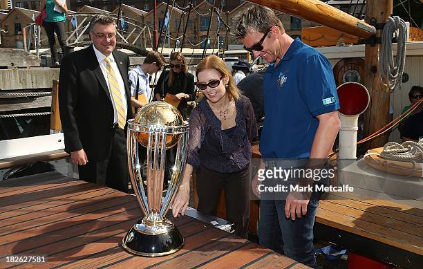 Cricket World Cup 2015 CEO John Harnden, Brett Lee and NSW Minister for Sport Gabrielle Upton look at the ICC Cricket World Cup trophy during...