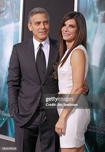 Actors Sandra Bullock and George Clooney attend the "Gravity" premiere at AMC Lincoln Square Theater on October 1, 2013 in New York City.