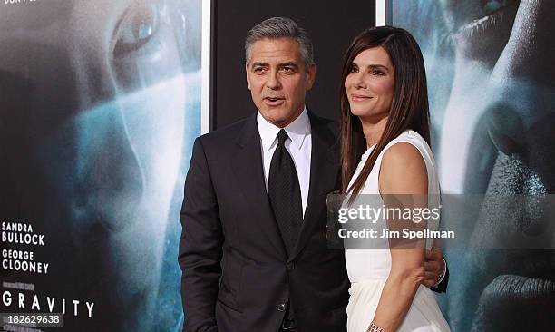 Actors Sandra Bullock and George Clooney attend the "Gravity" premiere at AMC Lincoln Square Theater on October 1, 2013 in New York City.