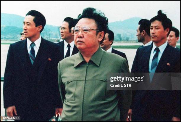 Photo dated 17 April 1992 shows North Korean leader Kim Jong-Il on the tarmac at Pyongyang Airport following a visit by then Chinese President Yang...