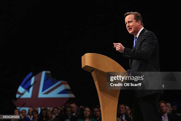 British Prime Minister David Cameron delivers his keynote speech on the last day of the annual Conservative Party Conference at Manchester Central on...