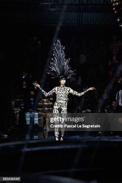 Model walks the runway during Louis Vuitton show as part of the Paris Fashion Week Womenswear Spring/Summer 2014 at Le Carre du Louvre on October 2,...