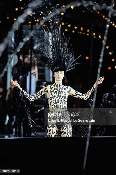 Model walks the runway during Louis Vuitton show as part of the Paris Fashion Week Womenswear Spring/Summer 2014 at Le Carre du Louvre on October 2,...