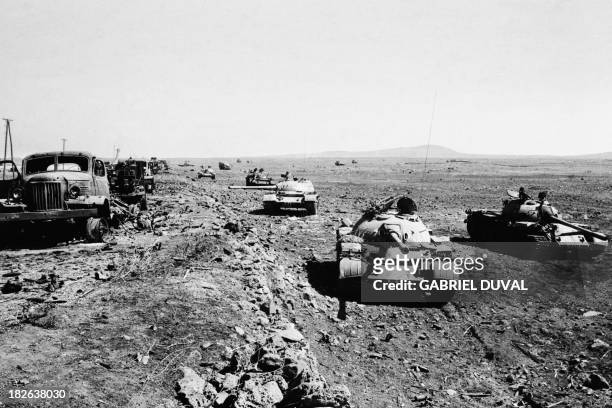 Syrian military convoy destroyed by the Israeli army is abandoned near a bridge on the Golan Heights, in October 1973 two weeks after the beginning...