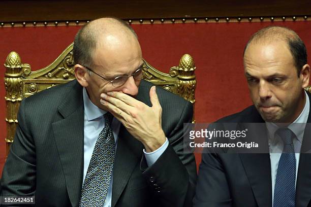 Prime Minister Enrico Letta and Deputy Prime Minister and Interior Minister Angelino Alfano chat during the confidence vote for their government at...