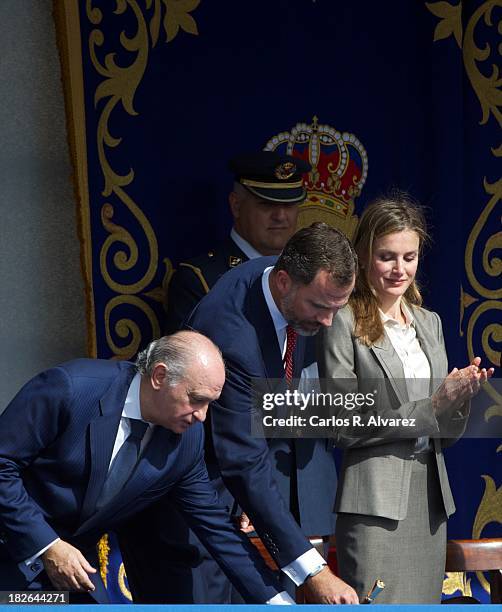 Spanish Interior Minister Jorge Fernandez Diaz , Prince Felipe of Spain and Princess Letizia of Spain attend the celebration of Santos Angeles...