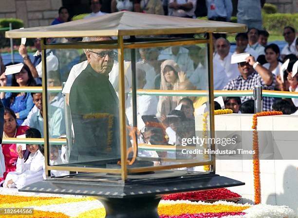 President Pranab Mukherjee paying homage to the Father of the Nation Mahatma Gandhi on the occasion of his 144th birth anniversary at his memorial at...