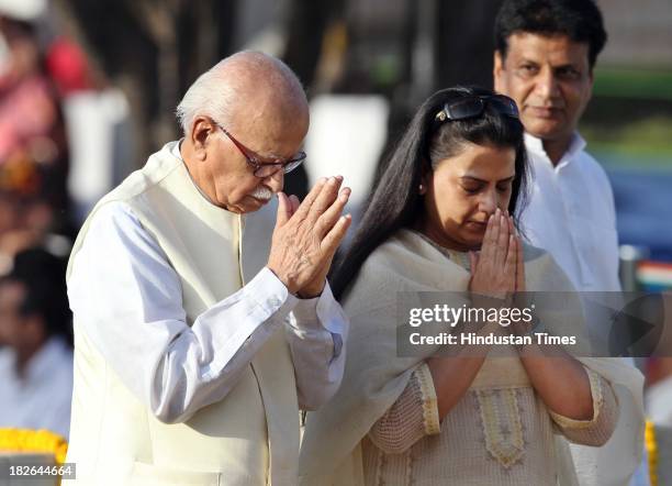 Senior leader L K Advani and his daughter Pratibha Patil paying homage to the Father of the Nation Mahatma Gandhi on the occasion of his 144th birth...